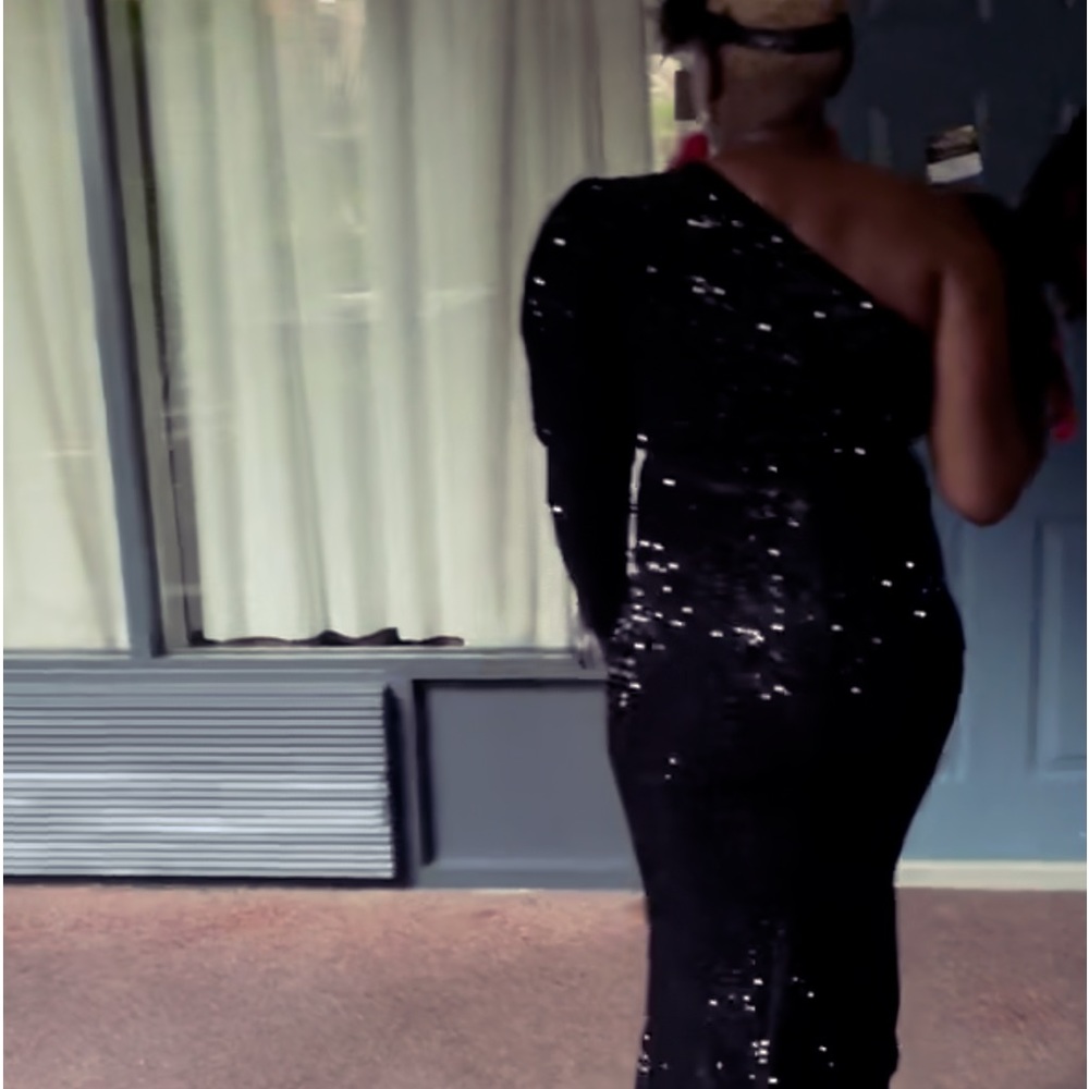 Absolutely beautiful dress conversation piece brand new with tag I had 2 wore 1